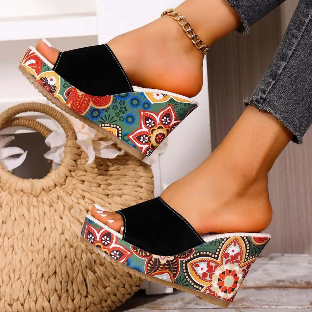 Joelle™ — Mules escultóricas con tacón floral